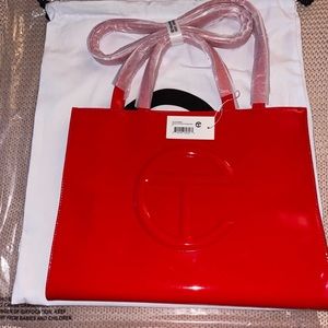 Brand new never used! Still have plastic, dust bag and paper on the handles.